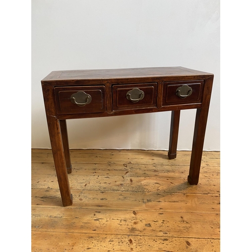 7 - CHINESE ELM SIDE TABLE QING DYNASTY 19TH CENTURY with 3 frieze drawers raised on square section legs... 