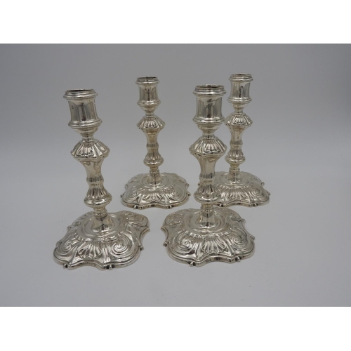 203 - SET OF FOUR GEORGE II CANDLESTICKSPHILLIPS GARDEN, LONDON, 1740in the rococo style18cm high62.8 oz.1... 