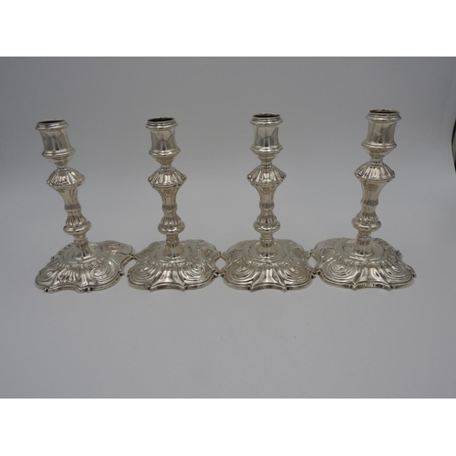 203 - SET OF FOUR GEORGE II CANDLESTICKSPHILLIPS GARDEN, LONDON, 1740in the rococo style18cm high62.8 oz.1... 