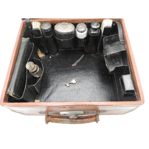 210 - EDWARDIAN LEATHER FITTED SILVER TOPPED TRAVELLING CASE LONDON, VARIOUS MAKERS AND DATES 35cm wide... 