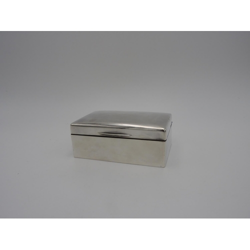 214 - GEORGE V SILVER CIGARETTE BOXWALKER & HALL, LONDON 1912of plain rectangular form13.5cm wide... 