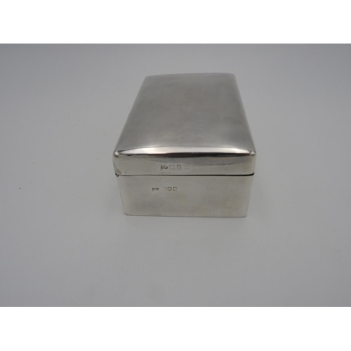 214 - GEORGE V SILVER CIGARETTE BOXWALKER & HALL, LONDON 1912of plain rectangular form13.5cm wide... 