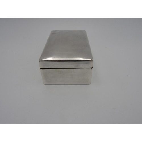 214 - GEORGE V SILVER CIGARETTE BOXWALKER & HALL, LONDON 1912of plain rectangular form13.5cm wide... 