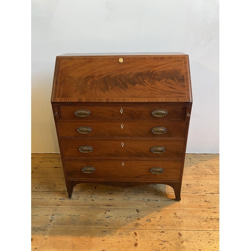 44 - LATE GEORGE III MAHOGANY CROSSBANDED BUREAU, CIRCA 1810 FULL FRONT FITTED INTERIOR, FOUR LONG GRADUA... 