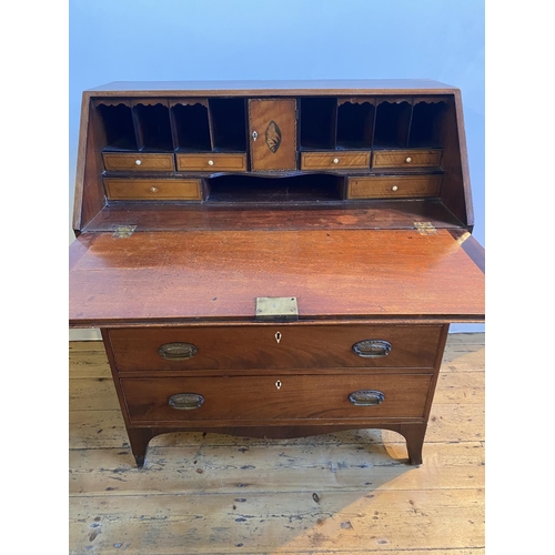 44 - LATE GEORGE III MAHOGANY CROSSBANDED BUREAU, CIRCA 1810 FULL FRONT FITTED INTERIOR, FOUR LONG GRADUA... 