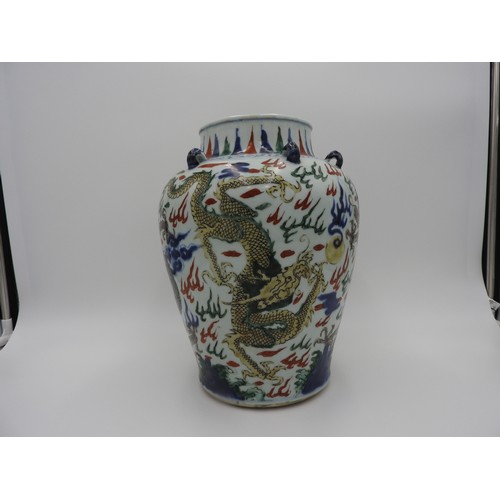 22 - WUCAI 'DRAGON' JARKANGXI PERIOD the baluster sides boldly painted in coloured enamels with ferocious... 