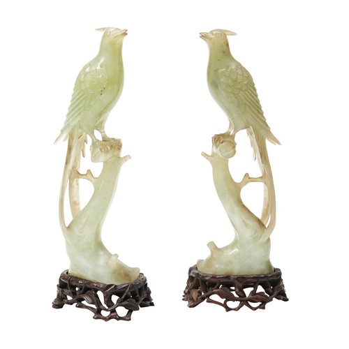 156 - PAIR OF HARDSTONE FIGURES OF BIRDSperched on naturalistic stumps, raised on carved hardwood stands19... 