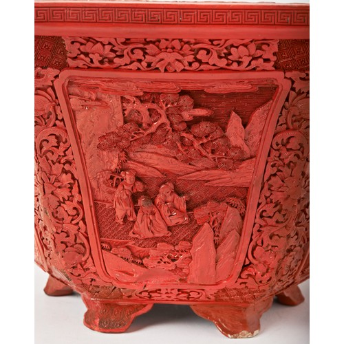 193 - FINE CARVED CINNABAR LACQUER HEXAGONAL JARDINIEREQIANLONG PERIODthe rim carved with lotus flowers an... 