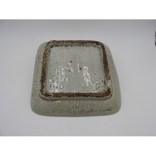 615 - SWATOW-TYPE SQUARE SHAPED BLUE AND WHITE DISH 17TH / 18TH CENTURYpainted in underglaze blue with sty... 