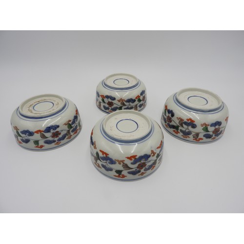 619 - SET OF FOUR IMARI DEEP BOWLS EDO PERIODthe deep rounded bowl each painted centrally with ships carry... 