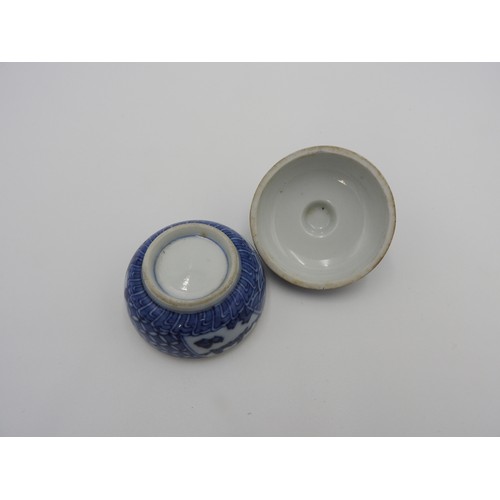 621 - JAPANESE BLUE AND WHITE CIRCULAR BOX AND COVER MEIJI PERIODthe sides painted with radiating panels o... 