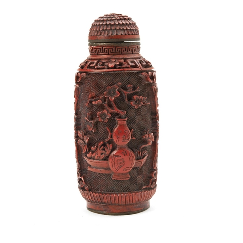 322 - CINNABAR LACQUER AND GILT-METAL SNUFF BOTTLELATE QING / REPUBLIC PERIODwith a apocryphal Qianlong se... 