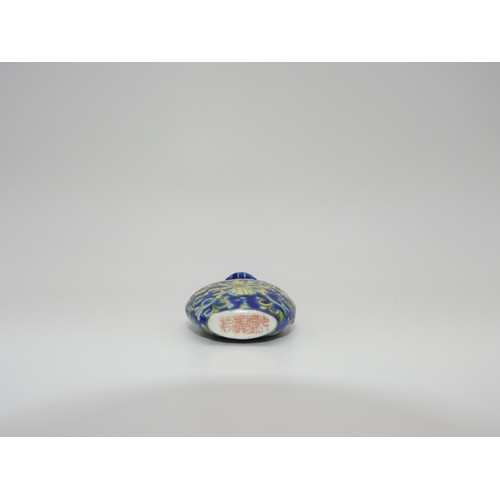 326 - MINIATURE BLUE GROUND 'LOTUS' BOTTLE VASELATE QING DYNASTYwith an apocryphal Qianlong seal mark6.5cm... 