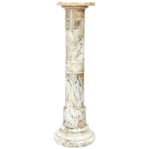 102 - A 19TH CENTURY TURNED ALABASTER SECTIONAL COLUMNthe circular socle base with decagonal platform108 c... 