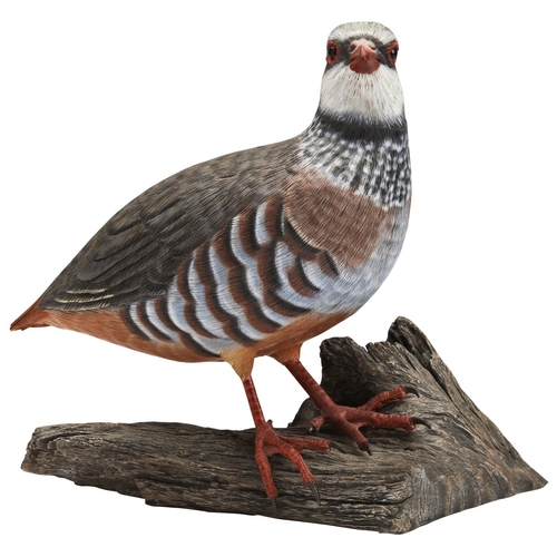 61 - A FIGURE OF A RED LEGGED PARTRIDGE on a wooden base with branded mark ‘M W’, a grey partridge, a duc... 