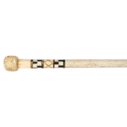 63 - A WHALEBONE WALKING STICK19TH CENTURY the marine ivory ‘Turks knot’ knop over a checker-board inlaid... 