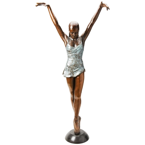 95 - A BRONZE BALLERINA STANDING ‘EN POINTE’patinated in two tones; 20th century, marked WM 8/9112 cm hig... 