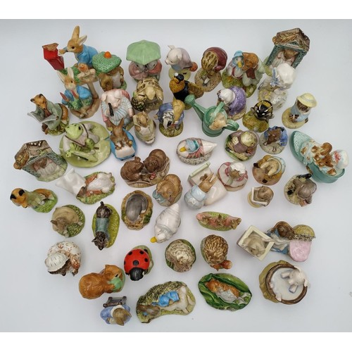 201 - A LARGE COLLECTION OF BESWICK AND ROYAL ALBERT BEATRIX POTTER FIGURESmainly 70s and 80s with brown b... 