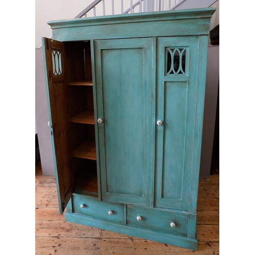 31 - TEAL BLUE PAINTED 19th CENTURY CONTINENTAL PINE 2-DOOR WARDROBE with 2 drawers below and 2 glazed pa... 