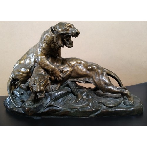 111 - AFTER EDOUARD DROUOTLES DEUX TIGRESa patinated bronze sculpture of two battling tigers, signed ‘E Dr... 