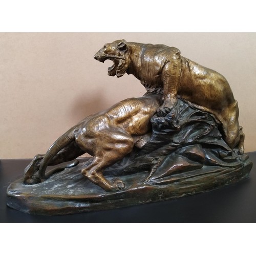 111 - AFTER EDOUARD DROUOTLES DEUX TIGRESa patinated bronze sculpture of two battling tigers, signed ‘E Dr... 