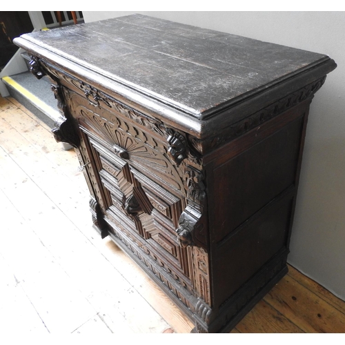 11 - ORNATE 19th CENTURY CONTINENTAL OAK CARVED GOTHIC SIDE CUPBOARD, WITH HERALDIC DETAILING (99cm wide,... 