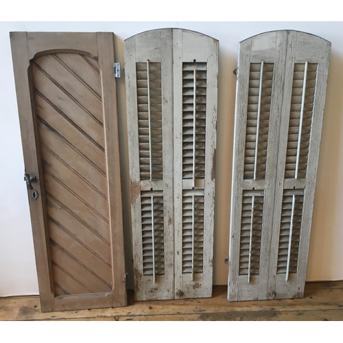 88 - A PAIR OF CREAM PAINTED DISTRESSED WINDOW SHUTTERS (150 x 46cms) AND A PINE WINDOW SHUTTER (149 x 48... 