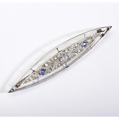 589 - An early 20th century French platinum , diamond and sapphire brooch, the elliptical shaped panel cen... 