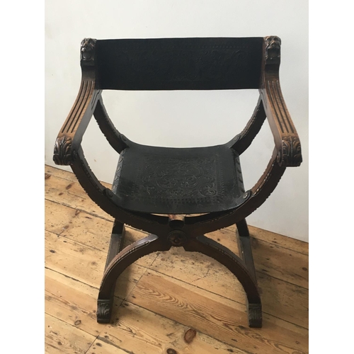 48 - 19th CENTURY SAVONAROLA FOLDING CHAIR, with ornate embossed leather seat and back panels89cm high x ... 