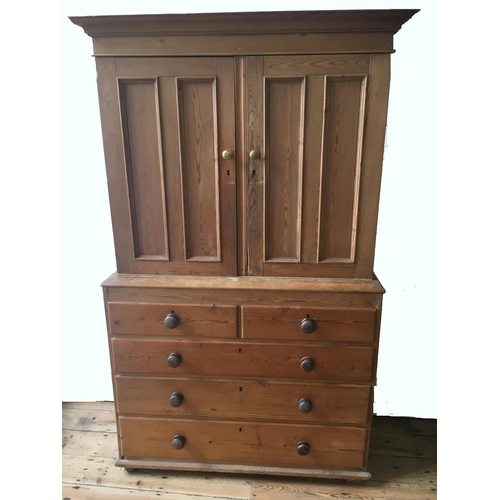 65 - 19th CENTURY WAXED PINE CUPBOARD ON CHEST