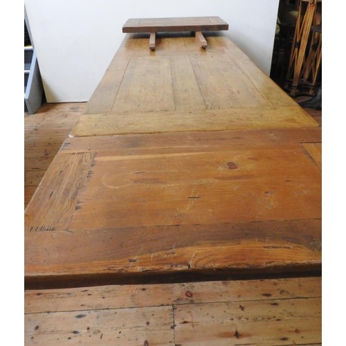 82 - A FRENCH 19th CENTURY OAK FARMHOUSE TABLE, with two side drawers and stretcher bar supporting square... 