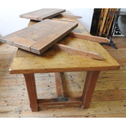 82 - A FRENCH 19th CENTURY OAK FARMHOUSE TABLE, with two side drawers and stretcher bar supporting square... 