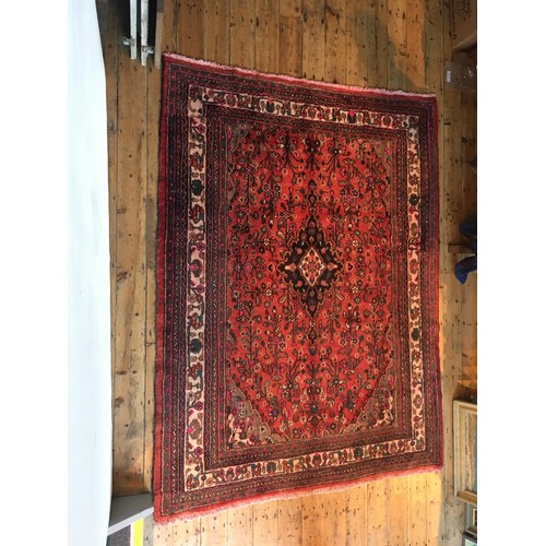 101 - AN IRANIAN RED AND BLUE HAND KNOTTED HAMADAN RUG, 280 x 215cm