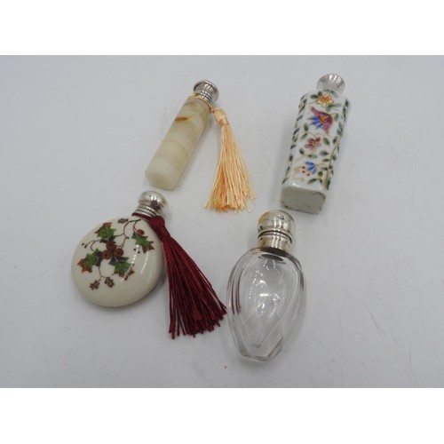 608 - THREE HALLMARK SILVER TOP SCENT BOTTLES AND GILDED FLORAL DECORATED SCENT BOTTLE,  the three compris... 