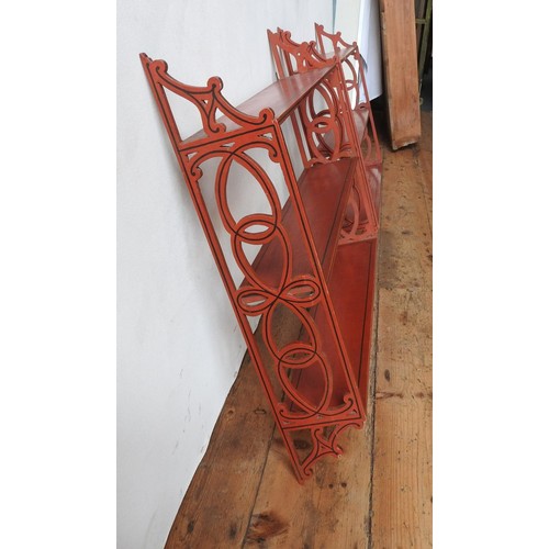 3 - PAIR OF RED PAINTED HANGING WALL SHELVES20TH CENTURYwith fret pierced sides67cm high, 69.5cm wide... 