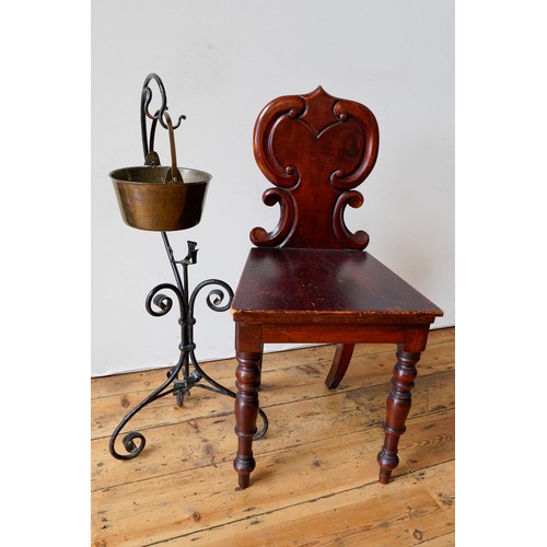 10 - A VICTORIAN MAHOGANY PANEL BACK HALL CHAIR AND BRASS PRESERVE PAN ON WROUGHT IRON STAND, the chair 8... 