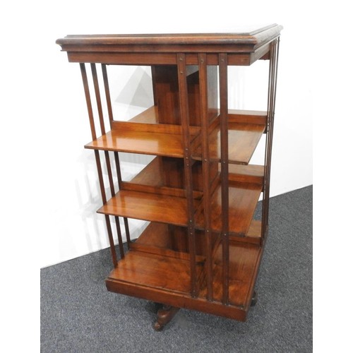 11 - A 19th CENTURY MAHOGANY 3-TIER REVOLVING BOOKCASE, on brass casters, 119cm high, 60cm square