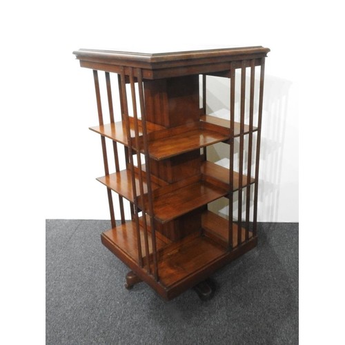 11 - A 19th CENTURY MAHOGANY 3-TIER REVOLVING BOOKCASE, on brass casters, 119cm high, 60cm square