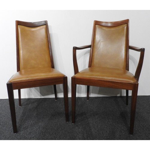 13 - A SET OF SIX RETRO G-PLAN TAN LEATHERETTE UPOHOLSTERED DINING CHAIRS, set comprising of two carver c... 