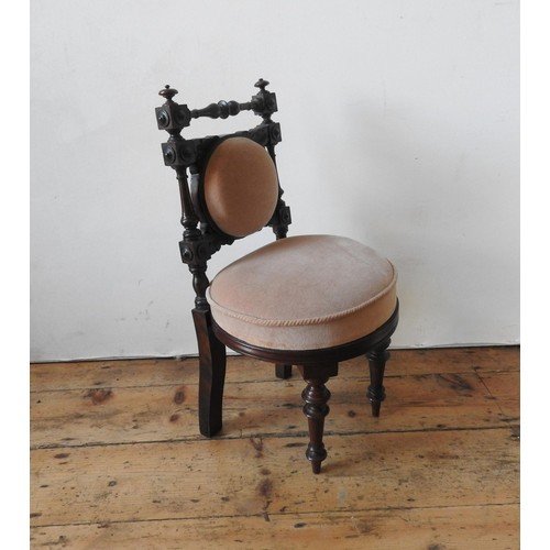 15 - A VICTORIAN MAHOGANY CHILD'S CHAIR, on turned wooden legs, with turned pillar back supports and leaf... 