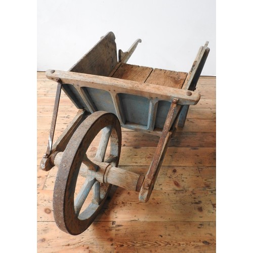 21 - A RUSTIC FRENCH 19th CENTURY BLUE PAINTED WHEEL BARROW, with removable side panels, 59 x 67 x 190cms