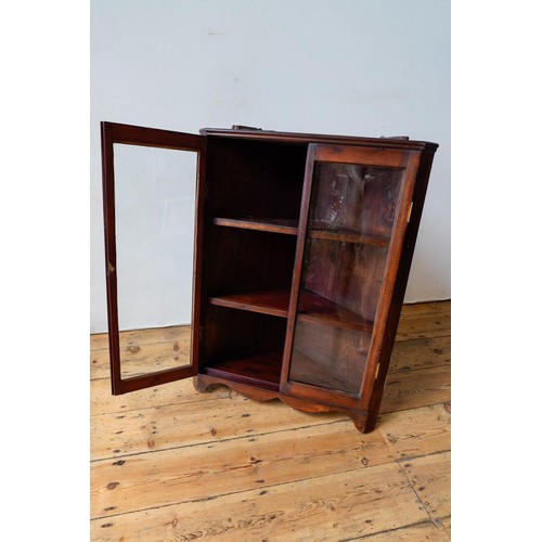 24 - A STAINED PINE 2-DOOR GLAZED WALL MOUNTED CORNER DISPLAY CABINET, 85 x 66cms