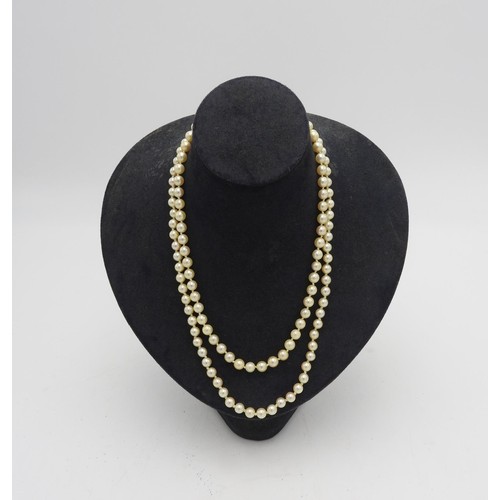 515 - TWO CULTURED PEARL NECKLACES, BOTH WITH 9CT GOLD CLASPS