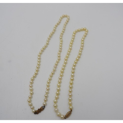 515 - TWO CULTURED PEARL NECKLACES, BOTH WITH 9CT GOLD CLASPS