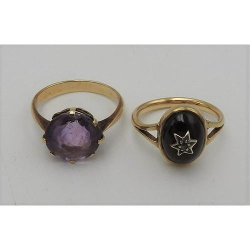 516 - AN AMETHYST SET DRESS RING AND SEED PEARL STAR DESIGN RING