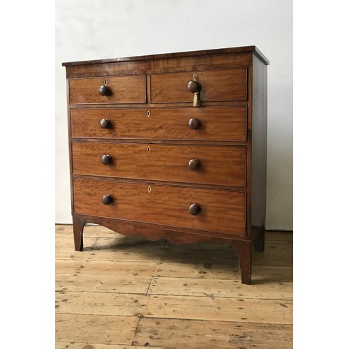 35 - A 19th CENTURY MAHOGANY CHEST OF FIVE DRAWERS ON SPLAYED BRACKET FEET, two short drawers over three ... 