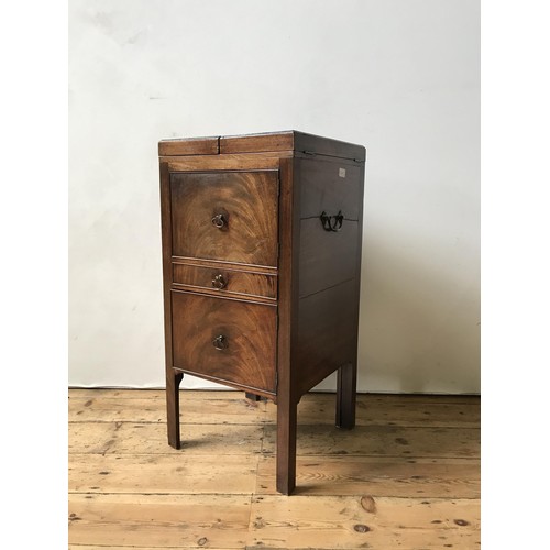 44 - A GEORGE III MAHOGANY GENTLEMAN'S COMMODE, with fold-out top section, lifting mirror panel, drawer a... 