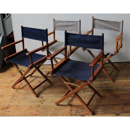 62 - A SET OF FOUR FOLDING DIRECTOR'S STYLE GARDEN CHAIRS