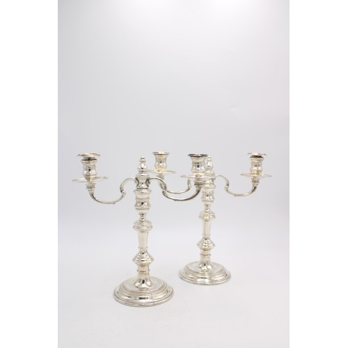 462 - A PAIR OF HALLMARK SILVER THREE BRANCH CANDELABRA, London 1972, 27cm high, 48.5oz total weight inc. ... 