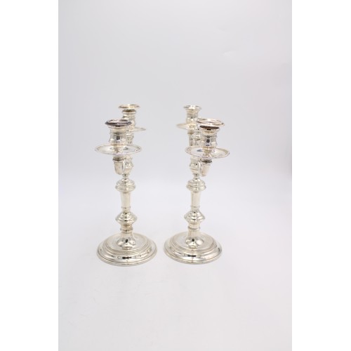 462 - A PAIR OF HALLMARK SILVER THREE BRANCH CANDELABRA, London 1972, 27cm high, 48.5oz total weight inc. ... 